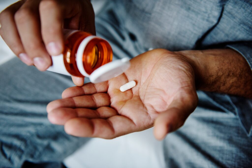 Man taking medicine